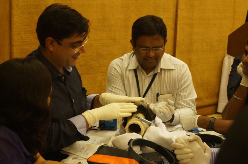Dr. Kapil Dua training a fellow doctor